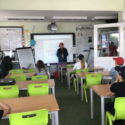 Gabriel (Year 6 pupil and North Beckton Primary School HeadStart Champion) delivering a special presentation to Key Stage 1 and Key Stage 2 pupils about Victory in Europe Day (VE Day).