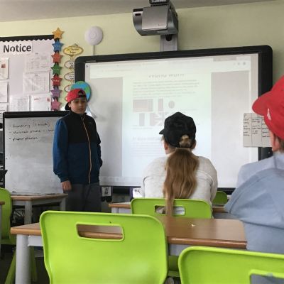 Gabriel (Year 6 pupil and North Beckton Primary School HeadStart Champion) delivering a special presentation to Key Stage 1 and Key Stage 2 pupils about Victory in Europe Day (VE Day).